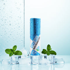 Blue bottle of STAYCOOL breath freshener spray with mint leaves on a light blue background