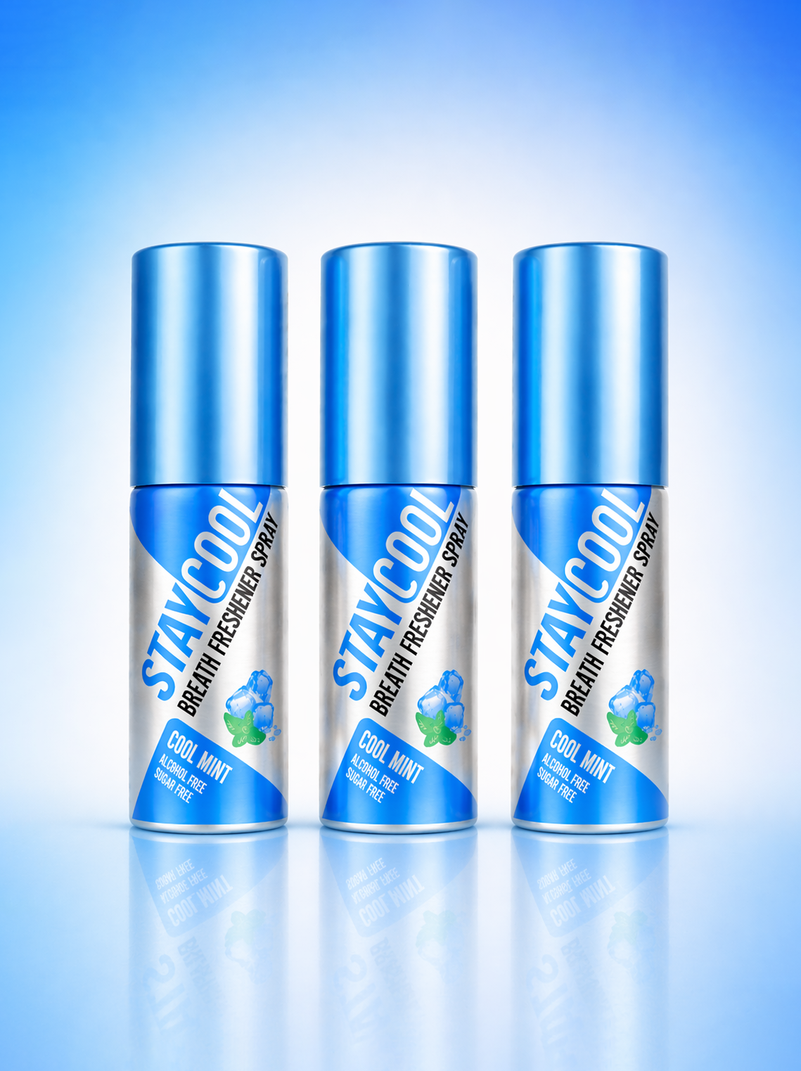 Three Stay Cool breath freshener cool mint flavor spray bottles on a blue gradient background