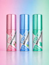 Three breath freshener sprays with colorful labels on a gradient background